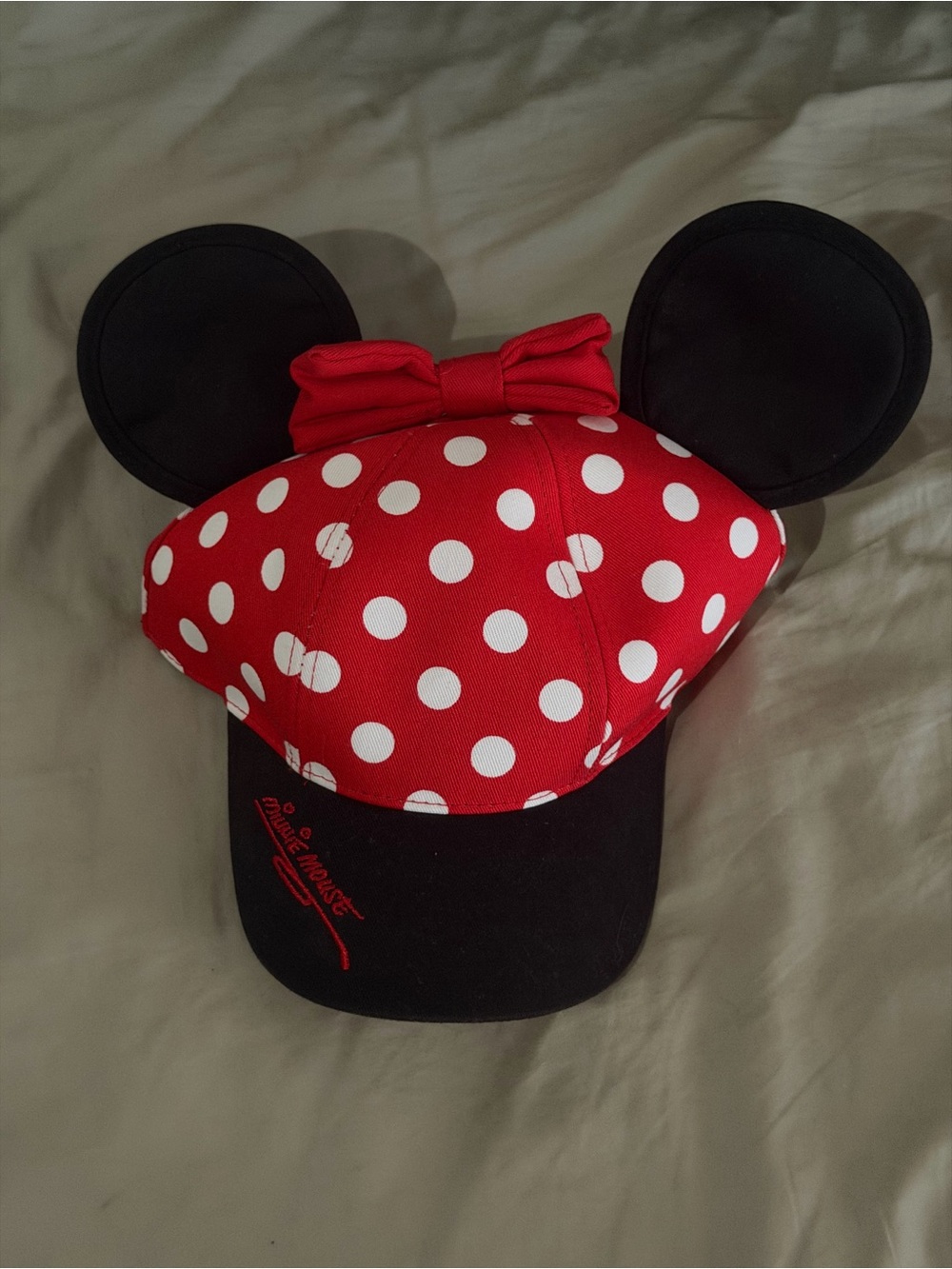 Disney unisex Red Polka Dot Minnie Mouse Ear Hat with Black Ears and bow